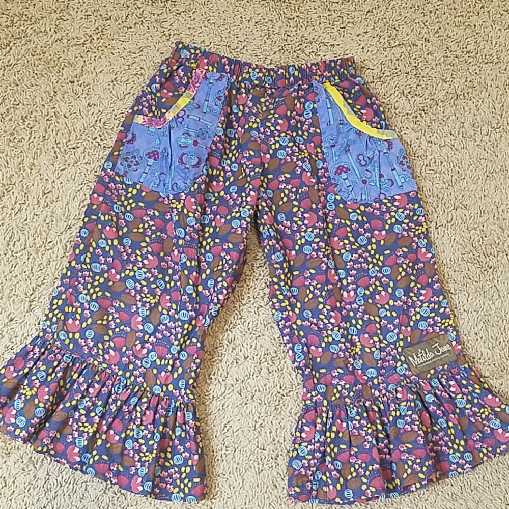 Ruffled pants or can be worn as capris.